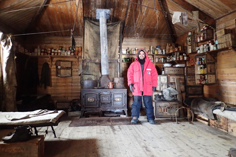 Greg inside the hut