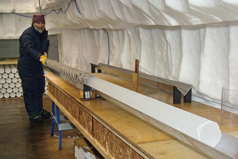 a scientist working on an ice core in antarctica
