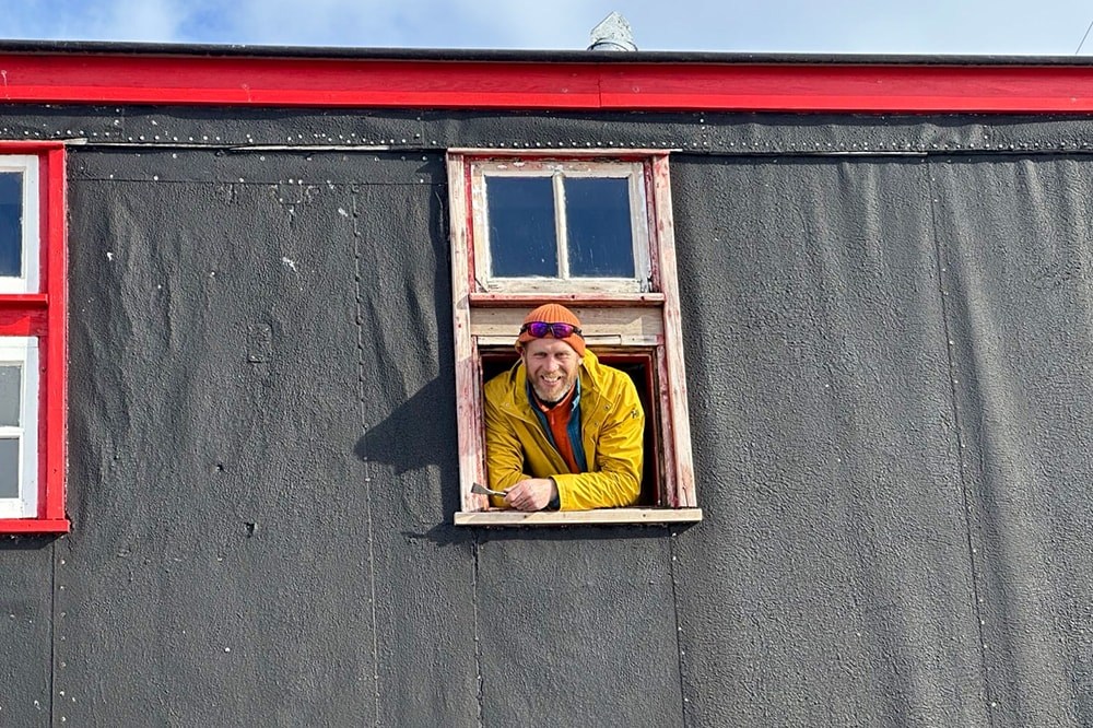 Jim leaning out of the window at Port Lockroy