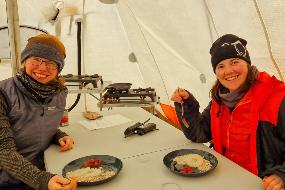Lesley & Ruth eating inside the tent