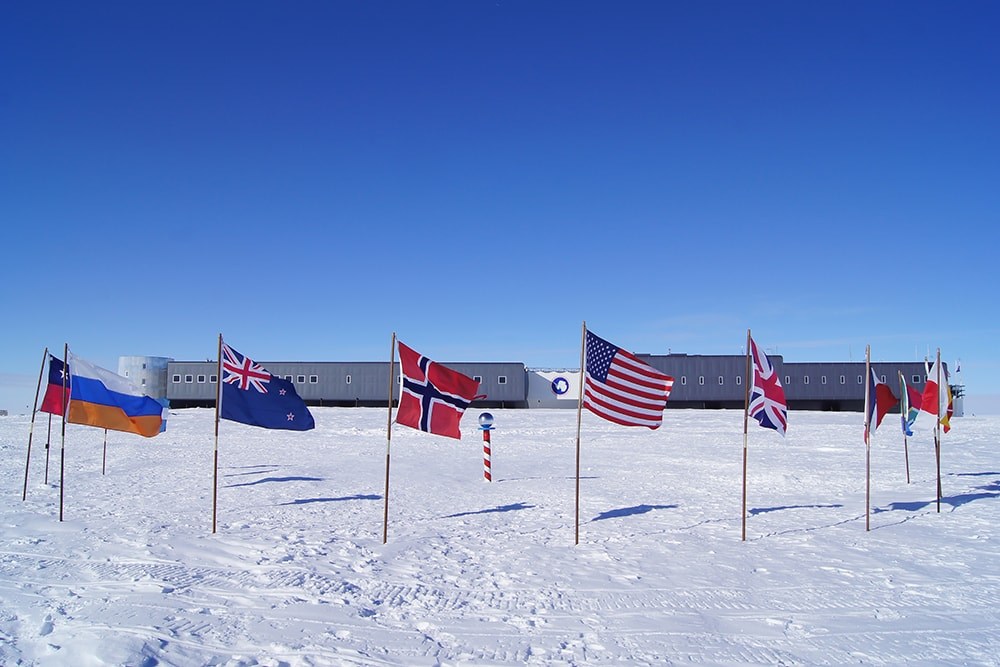 flags of the signatories at the south pole