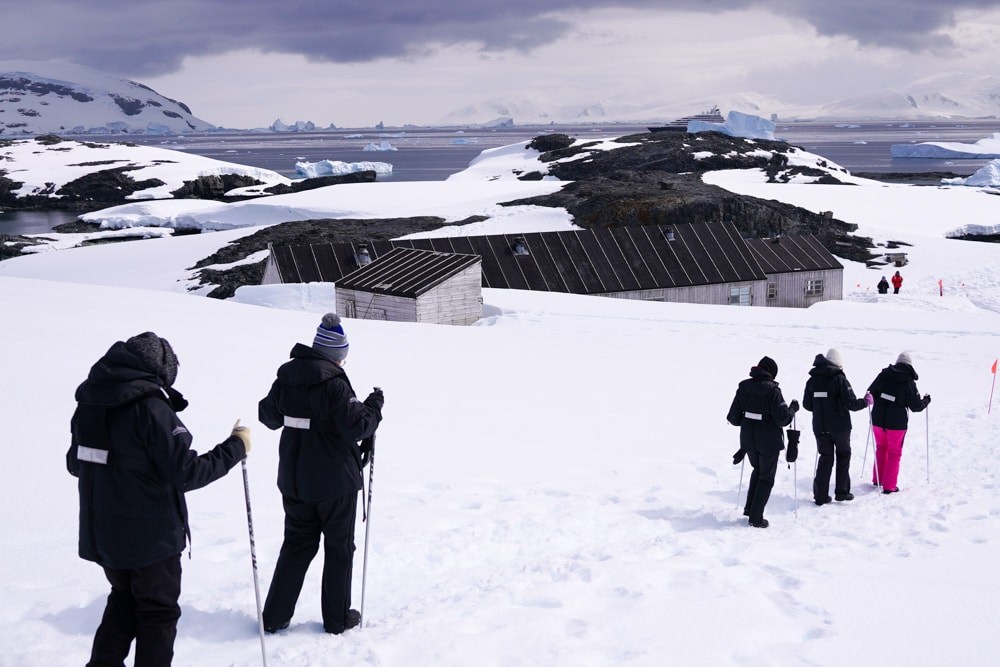 Visitors approach Detaille