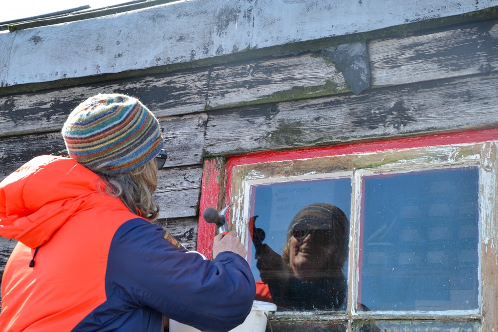 Lisa works on the windows